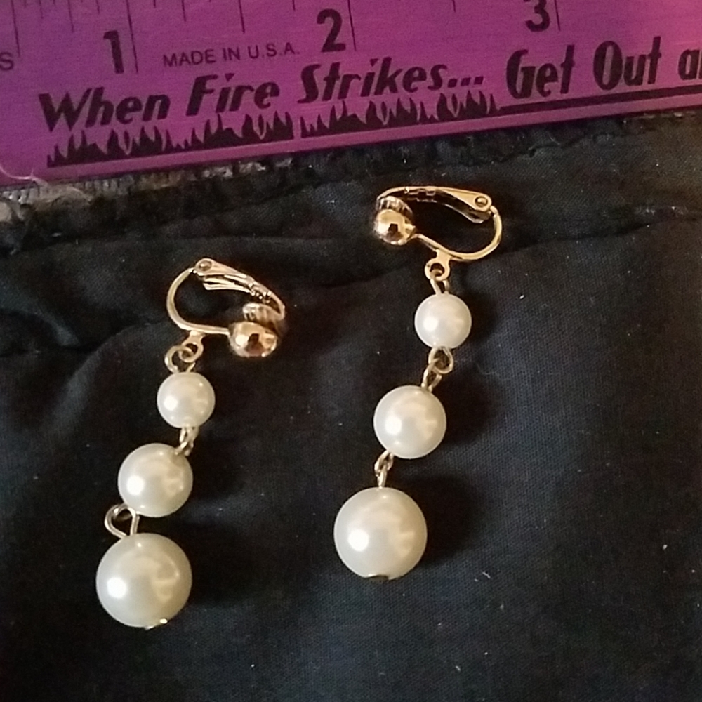 Costume dangle clip ons.